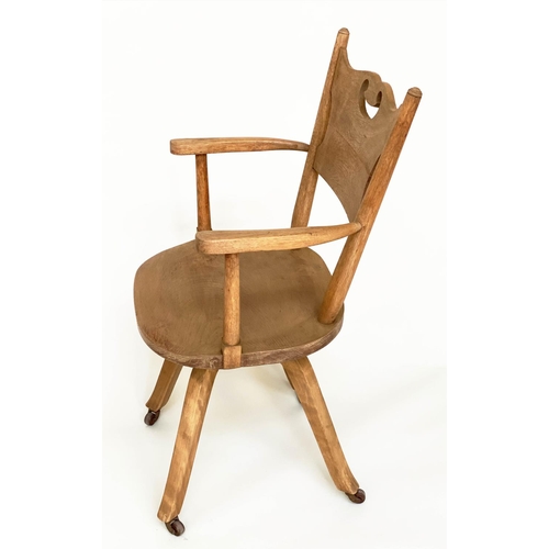 113 - DESK CHAIR, English 1930s oak with pierced back and revolving solid elm seat, 54cm W.