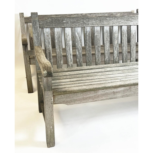 226 - GARDEN BENCHES, a pair, weathered teak of substantial slatted construction, 183cm W. (2)