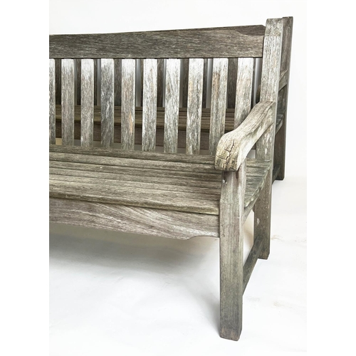 226 - GARDEN BENCHES, a pair, weathered teak of substantial slatted construction, 183cm W. (2)