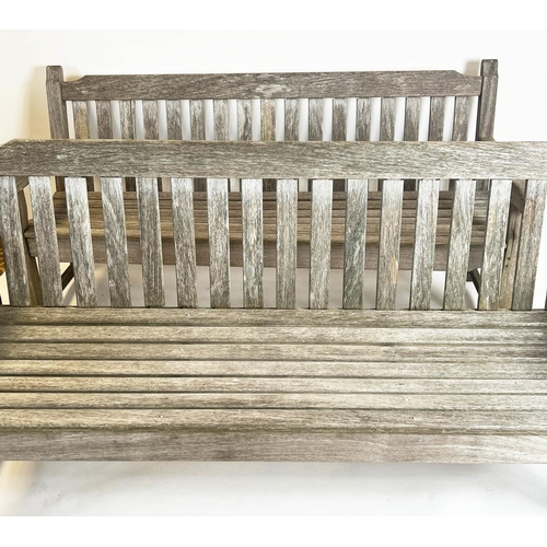 226 - GARDEN BENCHES, a pair, weathered teak of substantial slatted construction, 183cm W. (2)