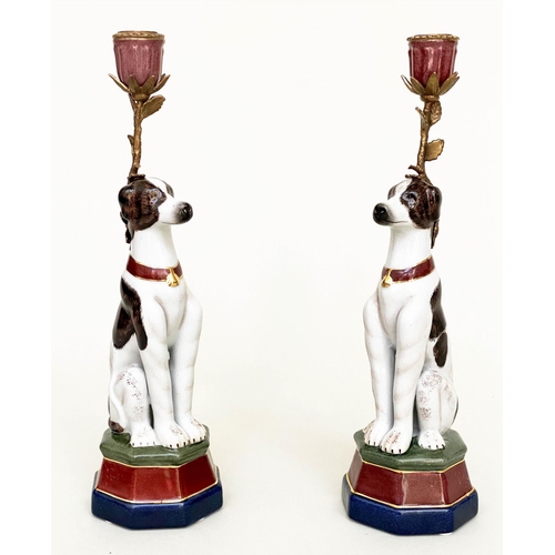 295 - 'DOG' CANDLESTICKS, a pair, Continental style painted porcelain and gilt metal mounted, 35cm H. (2)