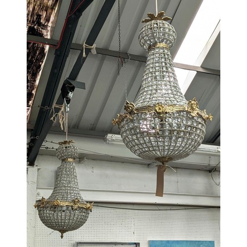 424 - REGENCY STYLE CHANDELIERS, pair, gilt metal and glass, baluster form, 75cm H x 42cm diam. (2)