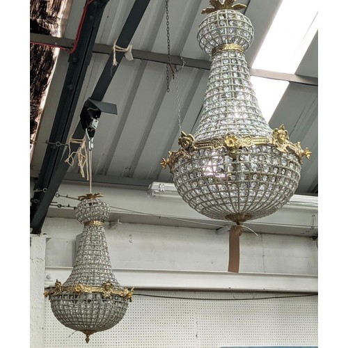 424 - REGENCY STYLE CHANDELIERS, pair, gilt metal and glass, baluster form, 75cm H x 42cm diam. (2)