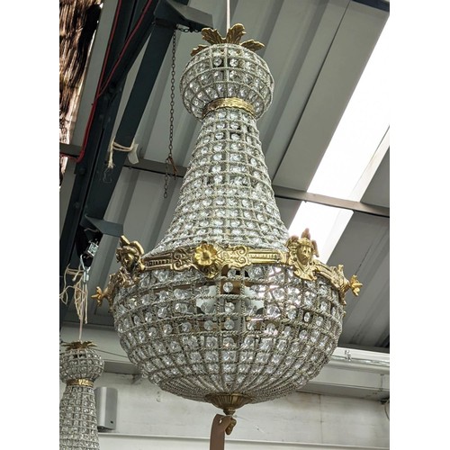 424 - REGENCY STYLE CHANDELIERS, pair, gilt metal and glass, baluster form, 75cm H x 42cm diam. (2)