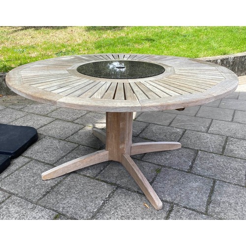 117 - GARDEN TABLE, large circular teak with granite lazy Susan centre, by Neptune, 150cm W and a cantilev... 