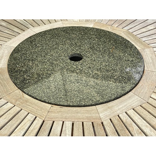 117 - GARDEN TABLE, large circular teak with granite lazy Susan centre, by Neptune, 150cm W and a cantilev... 