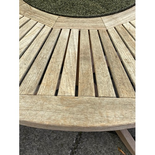 117 - GARDEN TABLE, large circular teak with granite lazy Susan centre, by Neptune, 150cm W and a cantilev... 