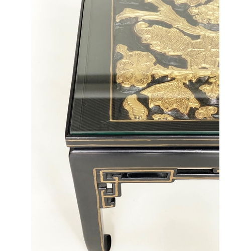 92 - LOW TABLE, Chinese lacquered and gilt, rectangular with carved giltwood foliate panel and glass top,... 