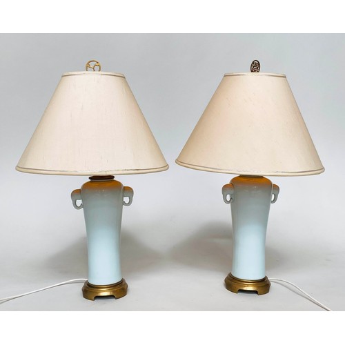 129 - TABLE LAMPS, a pair, Chinese style eau-de-nil ceramic, slender vase form with elephant head handles,... 