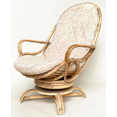 137 - TERRACE/VERANDAH ARMCHAIR, mid 20th century rattan framed and cane bound revolving and reclining (ro... 