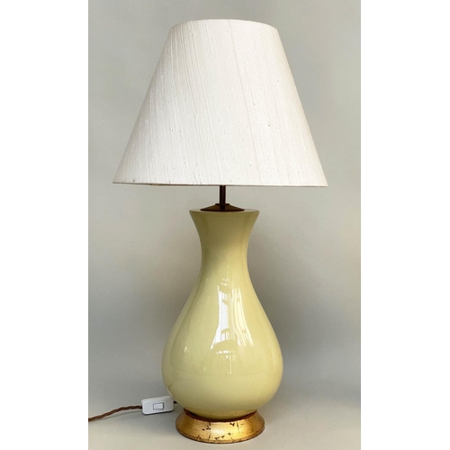 160 - TABLE LAMPS, a pair, 'Louisa' lemon yellow glazed ceramic of vase form with giltwood bases and spun ... 