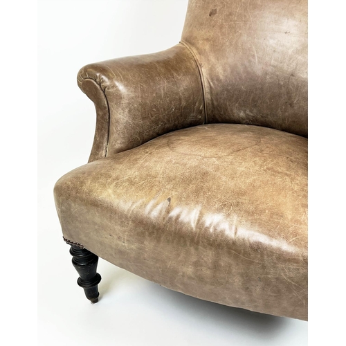 107 - BERGERE, 97cm H x 78cmW, Napoleon III ebonised in tan leather on brass ball castors.