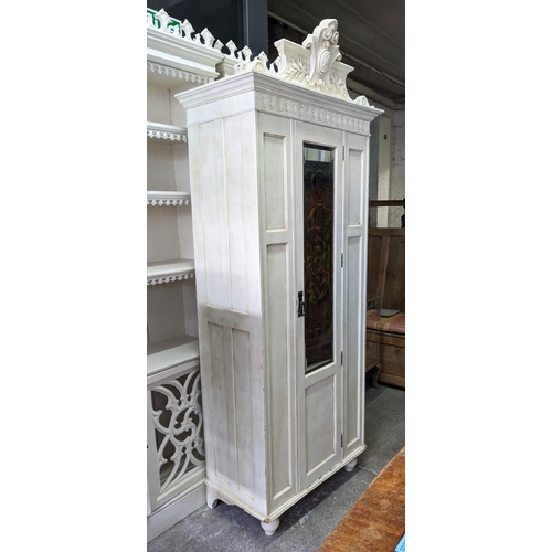 175 - ARMOIRE, 85cm W x 47cm D x 217cm H, 20th century cream painted in a distressed finished, with a carv... 