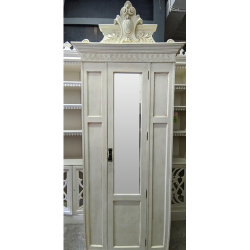 175 - ARMOIRE, 85cm W x 47cm D x 217cm H, 20th century cream painted in a distressed finished, with a carv... 