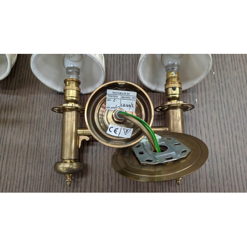 251 - BRASS SINGLE LIGHT WALL SCONCES, a set of five, 51cm H, adjustable with green shades and a pair of b... 