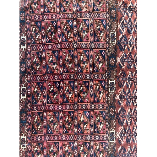 7 - ANTIQUE TURKMAN TEXTILES, three, largest 110cm x 66cm, together with a bokhara rug, 163cm x 127cm. (... 