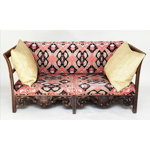 72 - 'KELIM' SOFA, late 19th/early 20th century carved oak with kelim style upholstery and pierced frieze... 