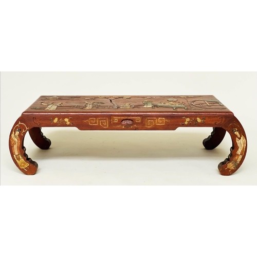 78 - LOW TABLE, mid 20th century Chinese elm and painted with raised stone figure decoration and scroll e... 