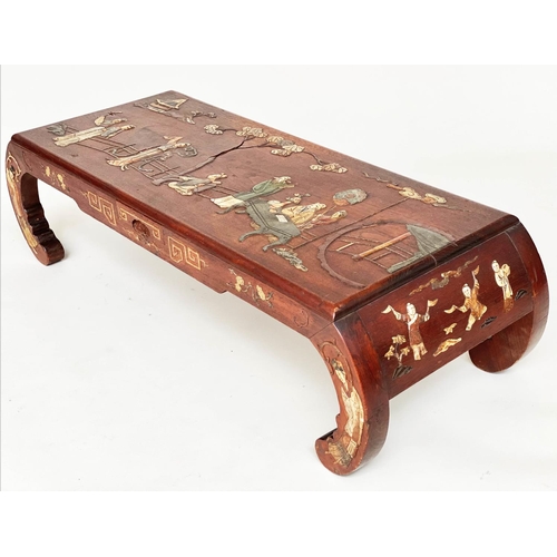 78 - LOW TABLE, mid 20th century Chinese elm and painted with raised stone figure decoration and scroll e... 