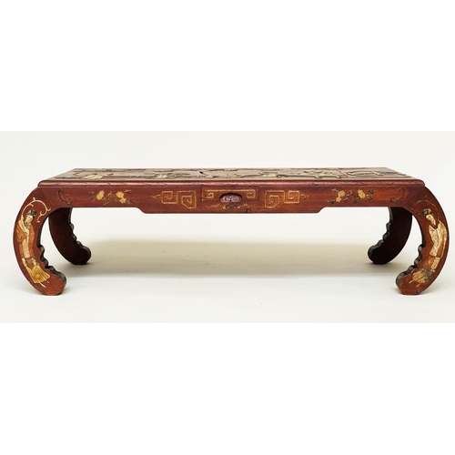 78 - LOW TABLE, mid 20th century Chinese elm and painted with raised stone figure decoration and scroll e... 