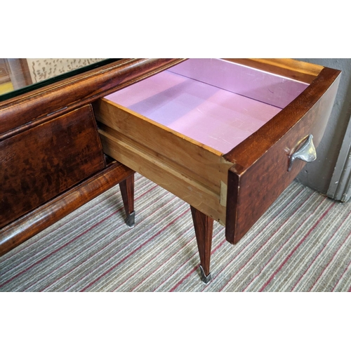 74 - BIJOUTERIE TABLE, 115cm W x 76cm H x 47cm D Art Deco manner with a glass top above three drawers on ... 