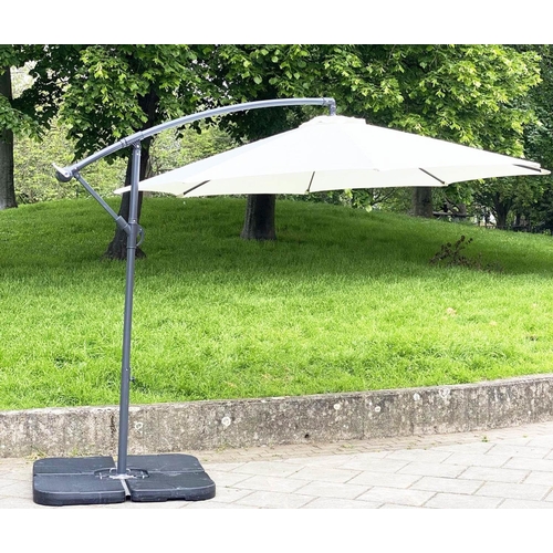 274 - CANTILEVER GARDEN PARASOL, circular cream canvas retractable 'winder action', with weighted (water) ... 