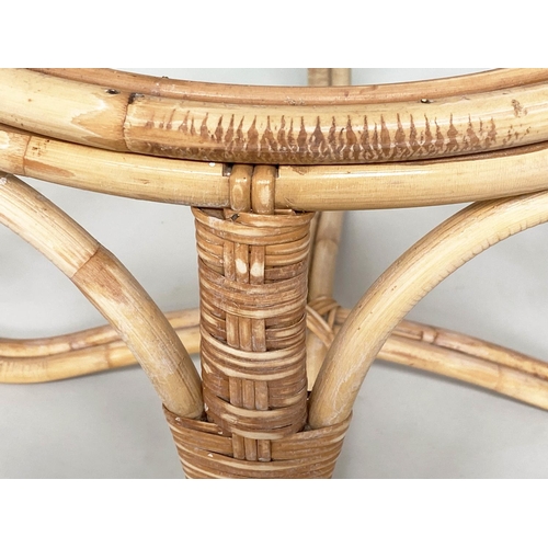 88 - LAMP TABLES, a pair circular rattan and cane bound with glazed tops, 56cm W x 50cm H. (2)