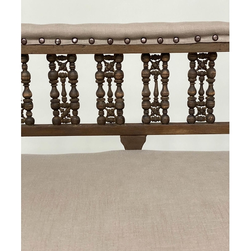 92 - HALL BENCH, early 20th century linen upholstered with Moorish style pierced fretwork back, 107cm W.
