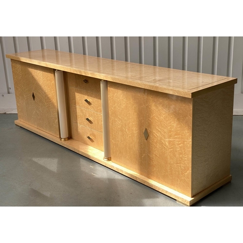 323 - TURRI SIDEBOARD, birds eye maple, and gilt metal mounted, with four drawers and two doors, shelves a... 