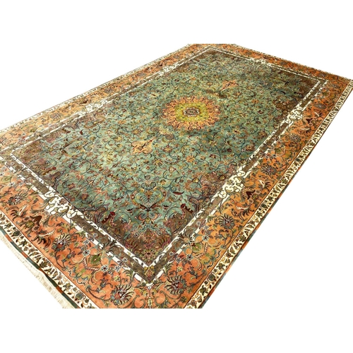 131 - FINE PURE SILK TEHRAN DESIGN CARPET, 305cm x 185cm.