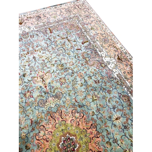 131 - FINE PURE SILK TEHRAN DESIGN CARPET, 305cm x 185cm.