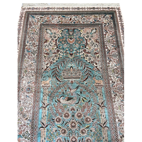 133 - FINE PURE SILK HEREKE DESIGN RUG, 178cm x 95cm.