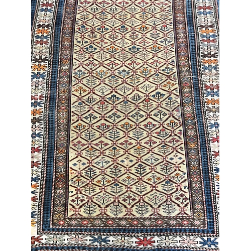 144 - ANTIQUE CAUCASIAN RUG, 185cm x 122cm.