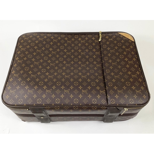 Sold at Auction: Monogram Canvas Rolling Suitcase, Louis Vuitton