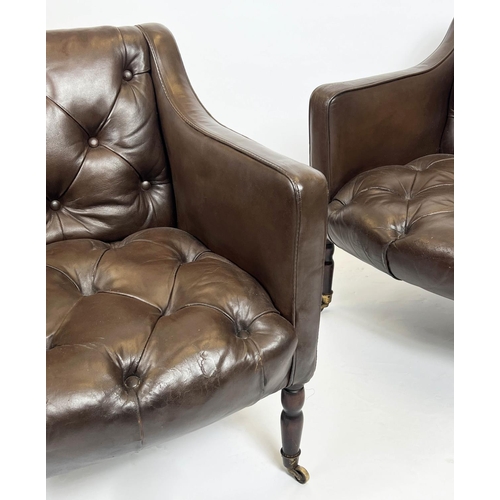 168 - CLUB ARMCHAIRS, a pair, each 65cm W x 75cm tall in buttoned brown leather, on turned supports, Prove... 