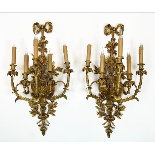 169 - WALL SCONCES, a pair, each 95cm x 40cm, late 19th century French gilt bronze with ribbon, floral, fo... 