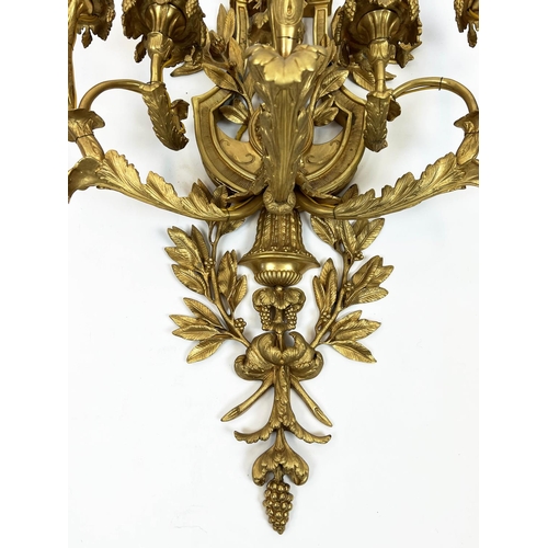 169 - WALL SCONCES, a pair, each 95cm x 40cm, late 19th century French gilt bronze with ribbon, floral, fo... 