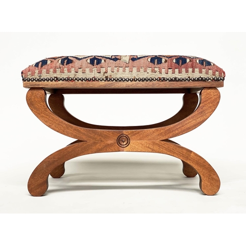 186 - KELIM FOOTSTOOL, Regency style mahogany with antique brass studded Kelim upholstery and  'X' form su... 