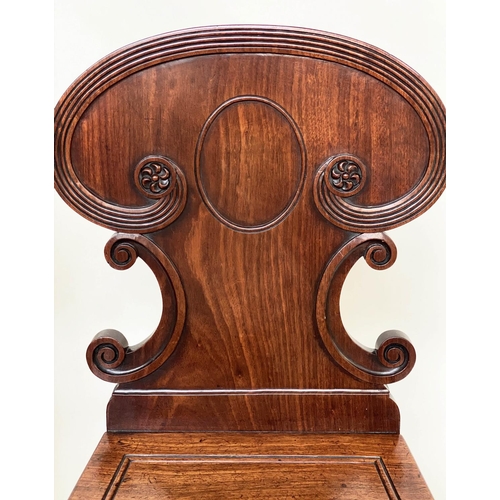 192 - HALL CHAIRS, a pair, 19th century William IV mahogany, each with scroll carved back and facetted fro... 