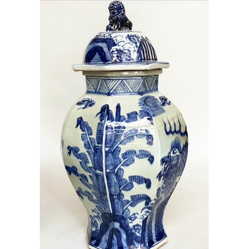 193 - TEMPLE JARS, a pair, Chinese blue and white ceramic with lids and facetted vase form, 68cm H. (2)