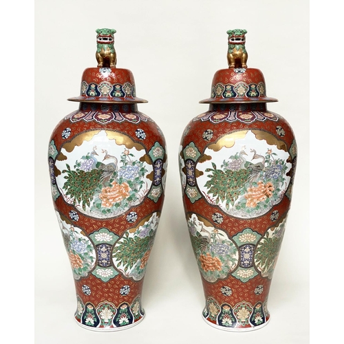 205 - TEMPLE JARS, a pair, very large Chinese ceramic vases with covers, hand decorated polychrome panels ... 