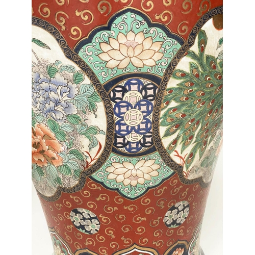 205 - TEMPLE JARS, a pair, very large Chinese ceramic vases with covers, hand decorated polychrome panels ... 