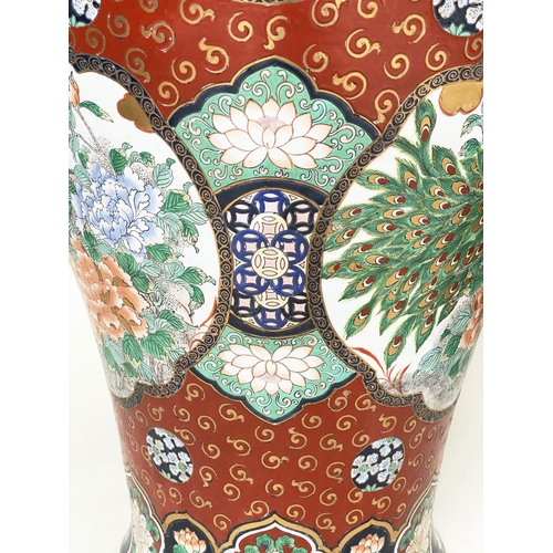 205 - TEMPLE JARS, a pair, very large Chinese ceramic vases with covers, hand decorated polychrome panels ... 