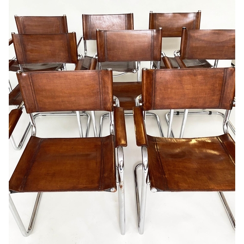 210 - DINING ARMCHAIRS, a matched set of eight Bauhaus design stitched tan leather and cantilever chrome f... 