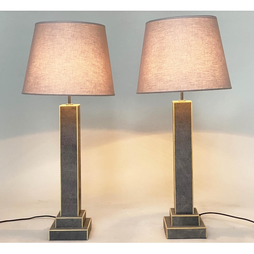 212 - TABLE LAMPS, a pair, faux shagreen and contrast trim each with square section column and stepped pla... 