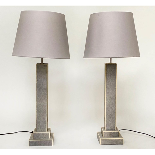 212 - TABLE LAMPS, a pair, faux shagreen and contrast trim each with square section column and stepped pla... 