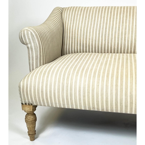 229 - SOFA, two seater, Victorian design with studded linen ticking upholstery and turned front supports, ... 