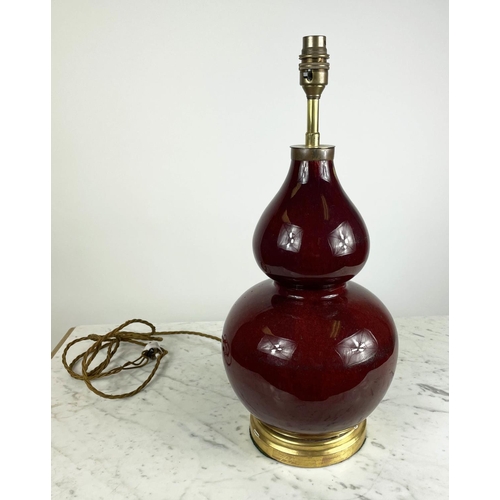 25 - CHINESE DOUBLE GOURD VASE LAMP, with a deep ox-blood red glaze, 50cm H.