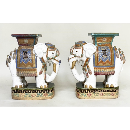 250 - ELEPHANT STOOLS, a pair, early 20th century Chinese ceramic white, green and blue in ceremonial atti... 