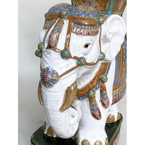 250 - ELEPHANT STOOLS, a pair, early 20th century Chinese ceramic white, green and blue in ceremonial atti... 